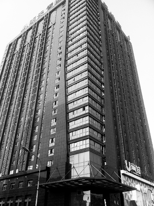 記者按照公開地址在鄭州一處寫字樓尋找一家軟件公司，一無所獲。