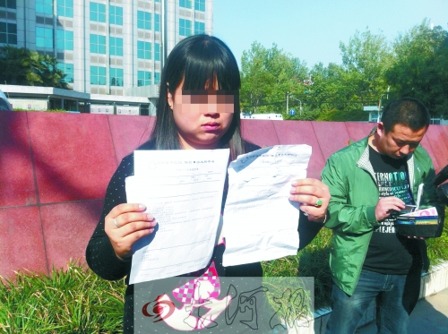 拿著兩份檢查結(jié)果完全相反的報告單,梁女士很郁悶。