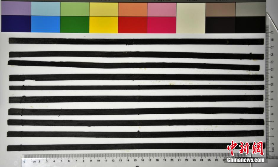 圖為漢代簡牘出土930支竹簡，在四川地區(qū)首次發(fā)現(xiàn)漢代簡牘。