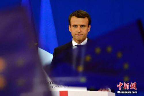 圖為馬克龍在慶祝集會上。中新社記者 龍劍武 攝